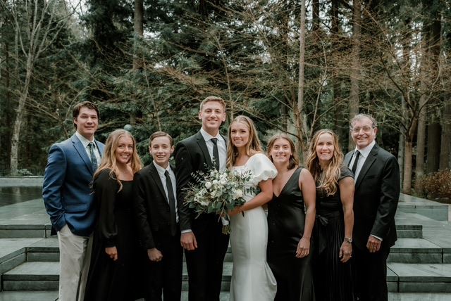 David & Gabrielle Jensen with family at wedding